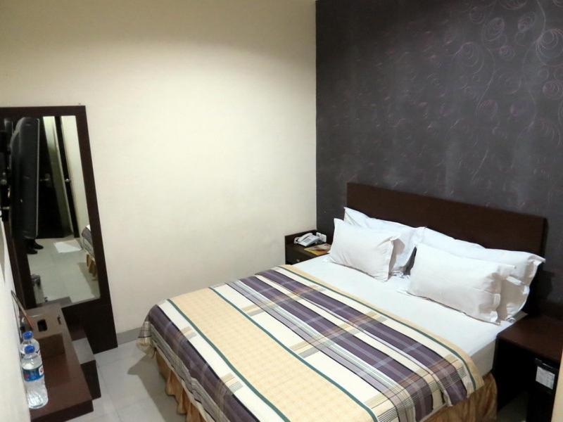 Vindhika Hotel Macáçar Quarto foto